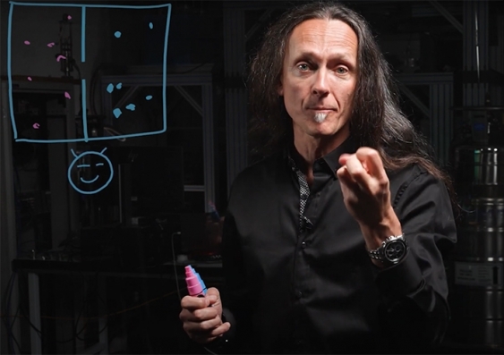 Professor Andrea Morello explains how the Maxwell's Demon thought experiment was analogous to his team's achievement by selecting only cool electrons for quantum computations. Photo: Richard Freeman/UNSW